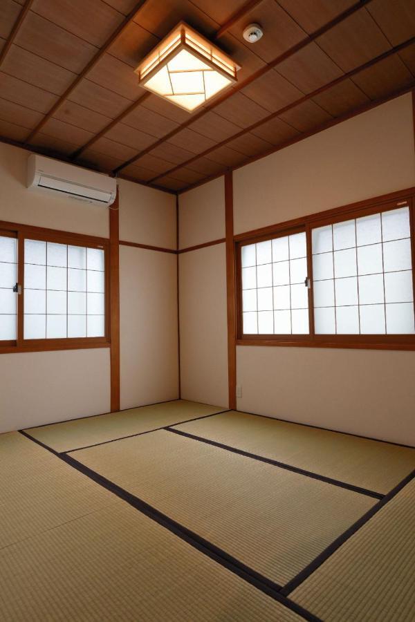 Guesthouse Iwase Toyama Station Exteriör bild